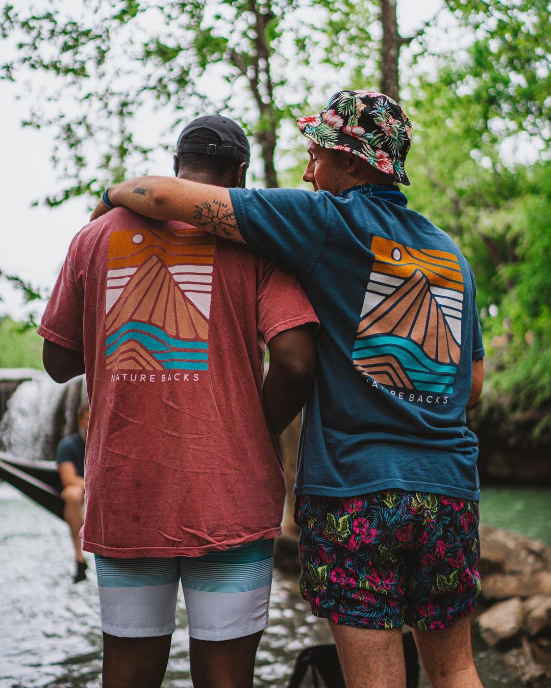 Two People standing in a Creek